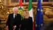 Italian President Sergio Mattarella is flanked by newly appointed Italian Premier Giorgia Meloni during the swearing in ceremony at Quirinal presidential palace in Rome, Saturday, Oct. 22, 2022, as Italy's first far-right-led government since the end